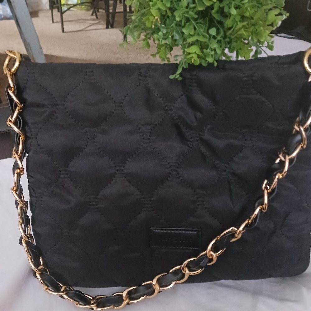 Cute black purse with gold chain strap